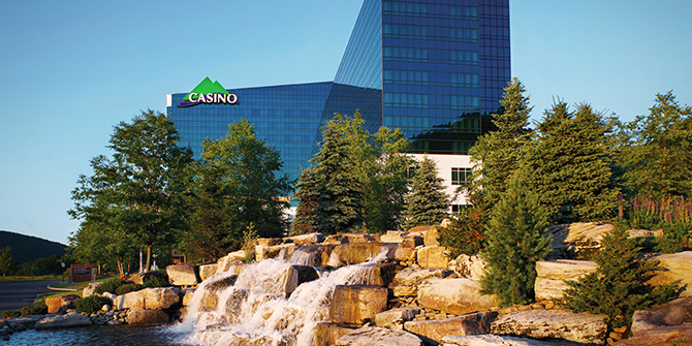 Seneca Allegany Casino with rock waterfall in front.